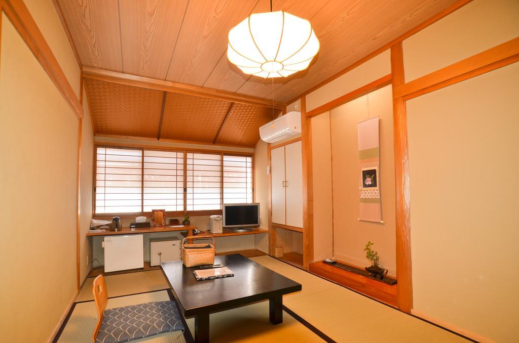 Kunisaki Hotell Unzen Rum bild